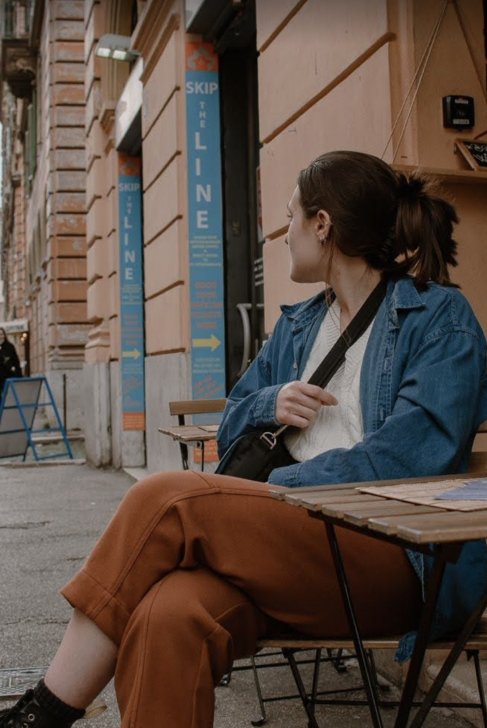 sitting at a cafe in Rome, Italy during study abroad program