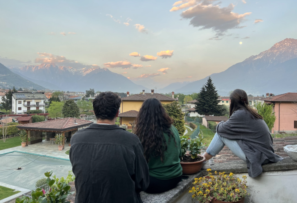 Friends watching sunset at Lake Como during study abroad